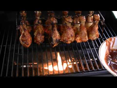 Grilled BBQ Chicken Legs or Wings Rack on a Propane Grill